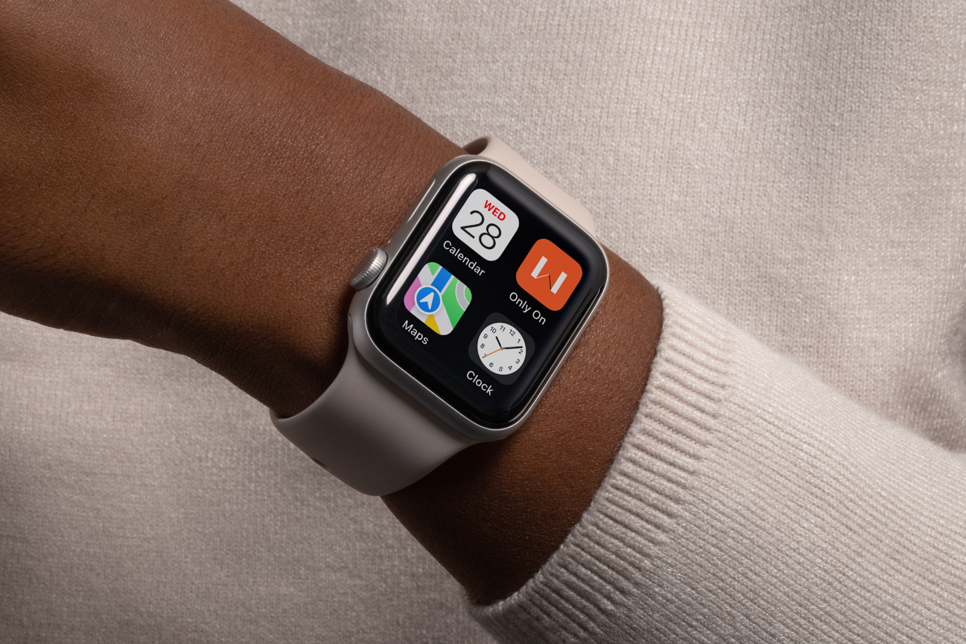 An Apple watch on a person's wrist showing the app icon for Only on Wednesdays