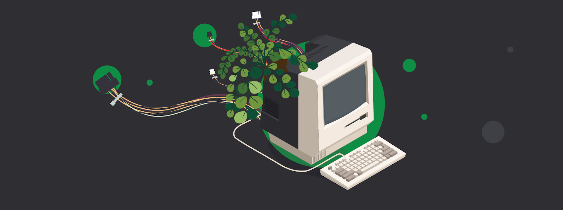 A computer with a small plant growing from it.  