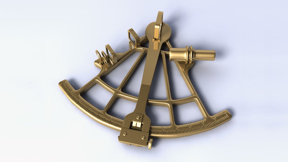 A brass sextant that is used for measuring angular distances
