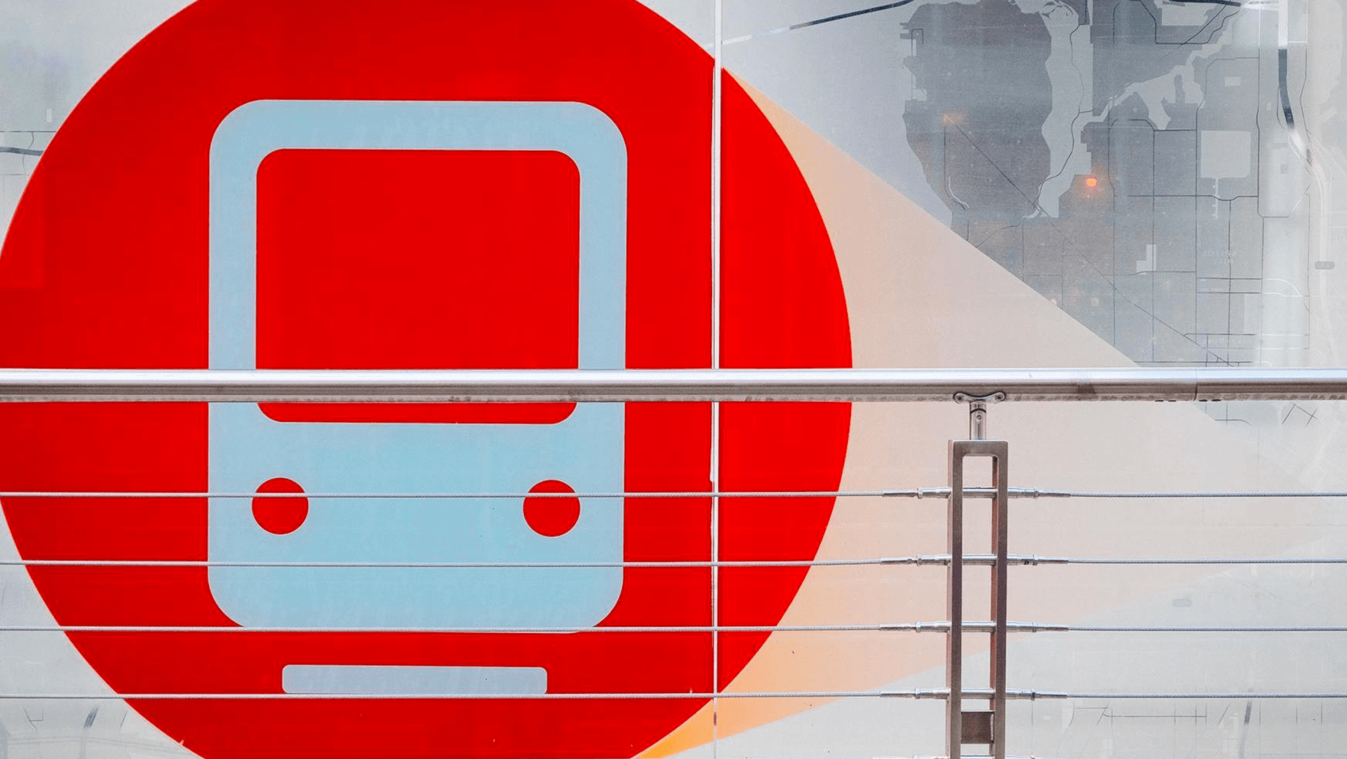Universal sign for a train against a bright red background Universal sign for a train against a bright red background