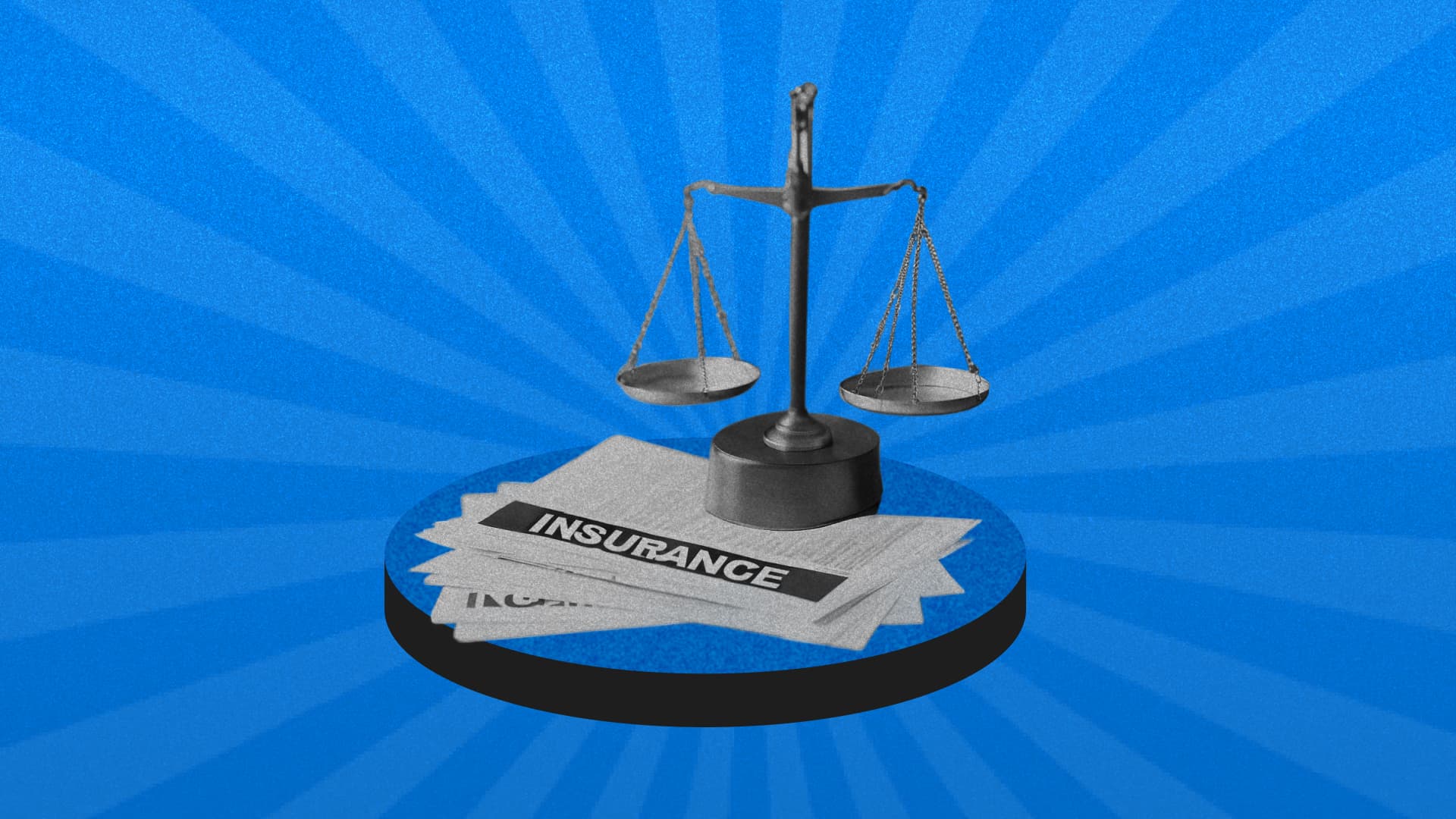 Balancing justice scales on top of insurance documents Balancing justice scales on top of insurance documents