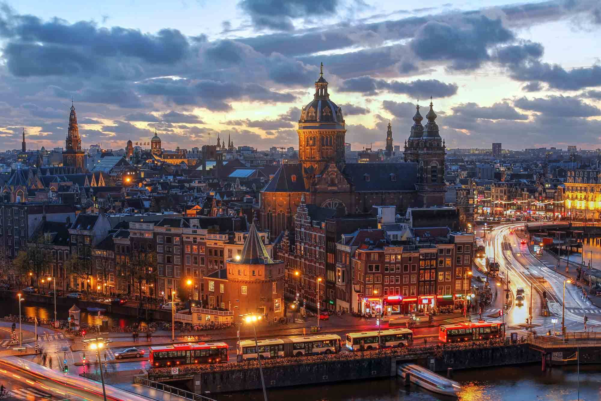 Amsterdam skyline in the evening. Amsterdam skyline in the evening.