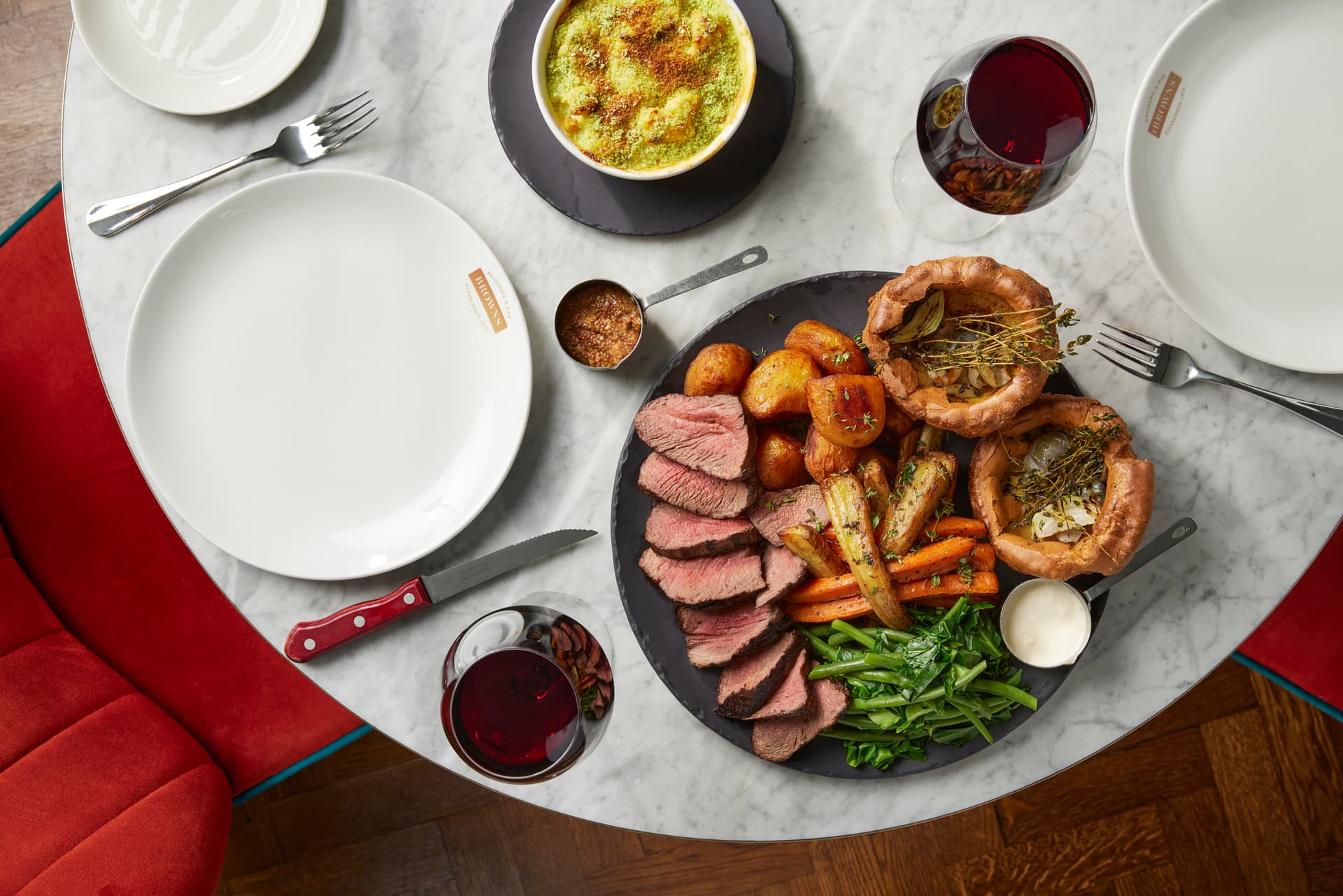 A roast dinner with cauliflower cheese. A roast dinner with cauliflower cheese.